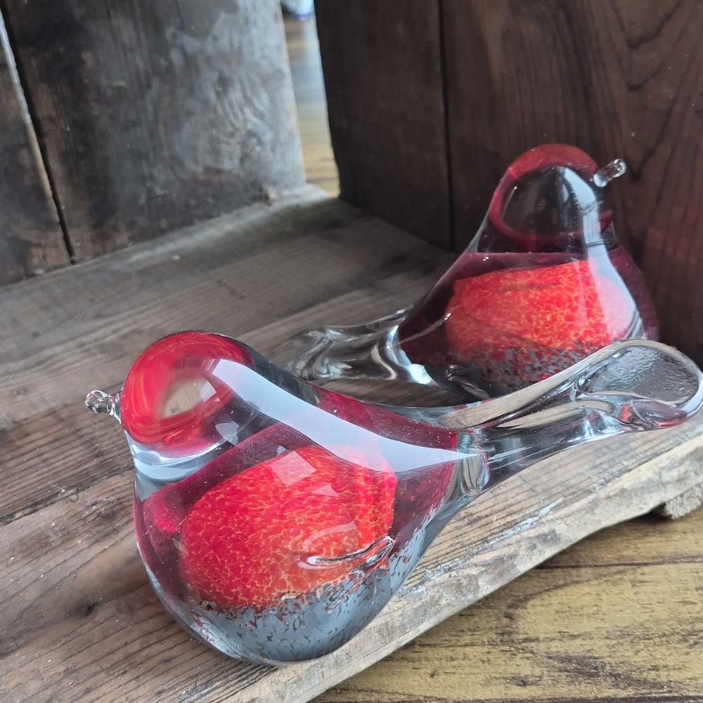 a pair of art glass birds/robins